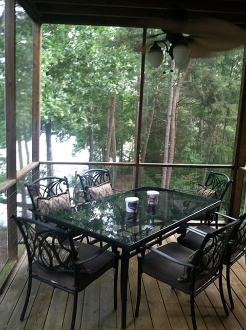 Table on porch (Main floor). Outdoor eating or entertaining.