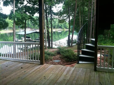 Porch and spiral staircase from main floor (1st floor). Room to stretch out.