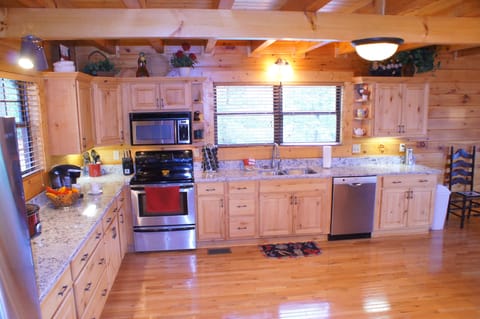 18 x 18 Kitchen with almost every cooking utensil you can think of. Well stocked