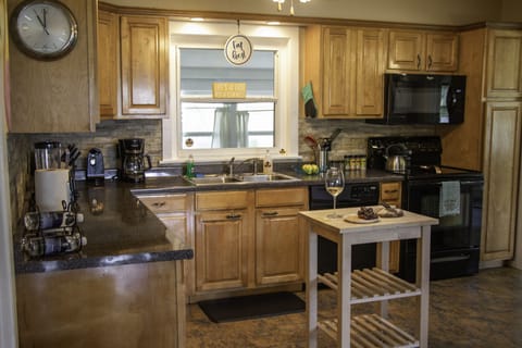 Well-equipped kitchen with plenty of counter space.