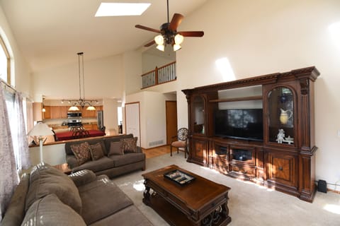 Large open living room with vaulted ceiling