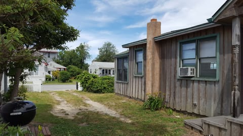 The rustic cedar siding adds to the quiant ambience of the cottage.