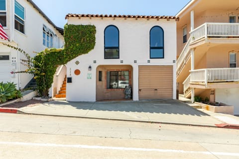 Our Enchanting Spanish Duplex is located a few steps away from the sand.  Grab the complimentary beach chairs and umbrellas and walk down the hill to a gorgeous, wide beach in North Manhattan Beach.