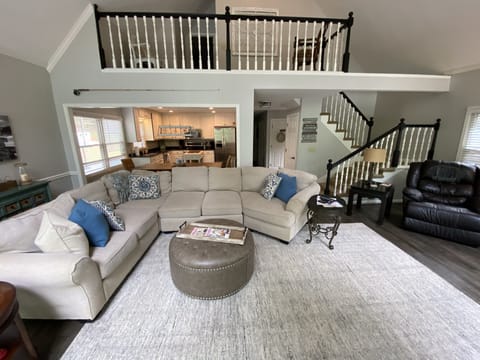 Spacious and comfortable family room with new LVP flooring 