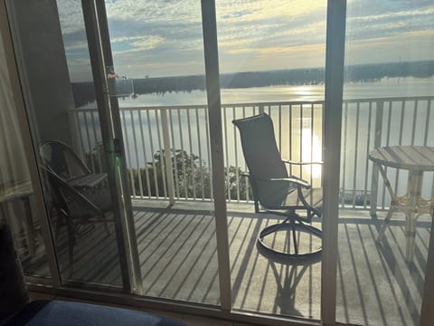 Balcony with sliding doors and seating