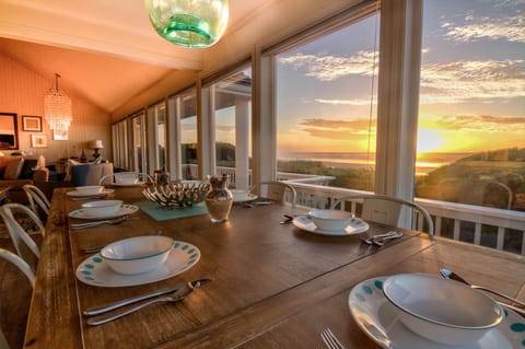 Sunset views to the south with miles of sandy beach in the distance.