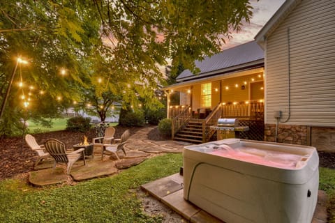 Evenings are better here—soak in the hot tub, grill dinner, and gather by the fire under the glow of string lights. It’s your own private backyard escape near downtown Blue Ridge.