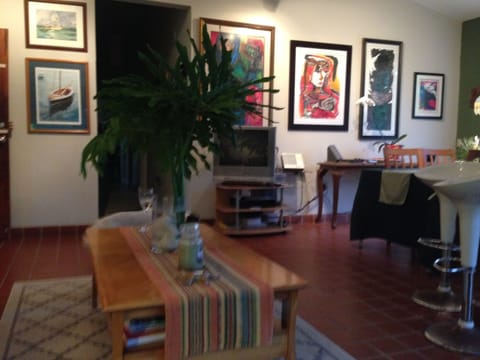 Family room with good art to lift your spirits.
