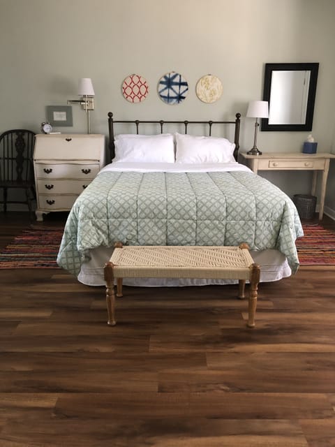 Two desks flank the bed in case you need to catch up on any work.