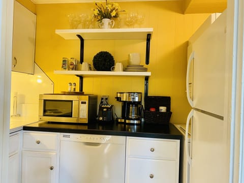 It’s compact nesting…with a full refrigerator and clothes washer & dryer too!