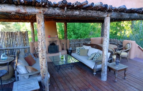 The rooftop deck is partially covered for shade and half open for sun. 