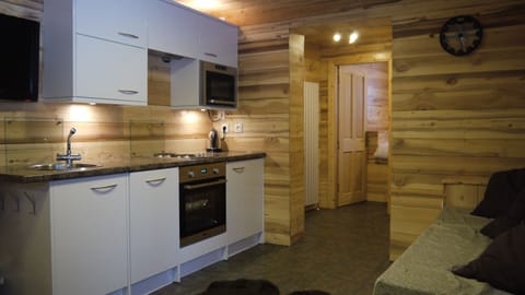 kitchen units. door to bedroom at far end