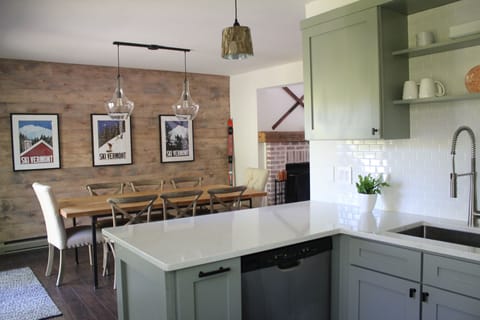 Kitchen has new coffee maker, toaster oven, blender, and waffle maker