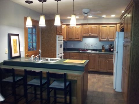 Stocked Kitchen with screened-in back poach