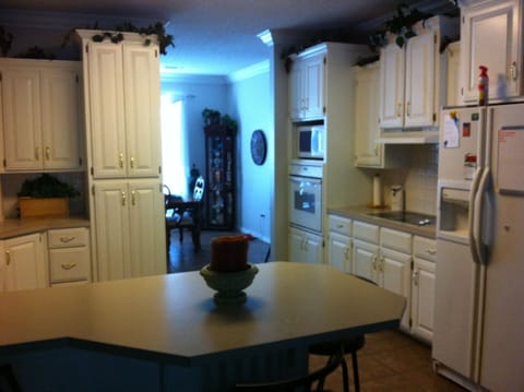 Open Kitchen, plenty of cabinet space and modern applicances