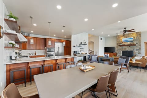 Seating for 20+ with concrete table, transformer table, & bar s