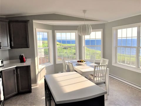 Enjoy stunning ocean views from the kitchen / dining area