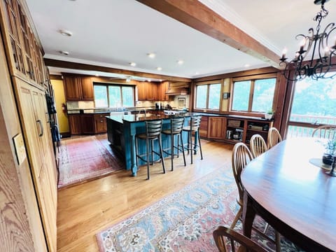 Kitchen and breakfast bar opens up to dining room