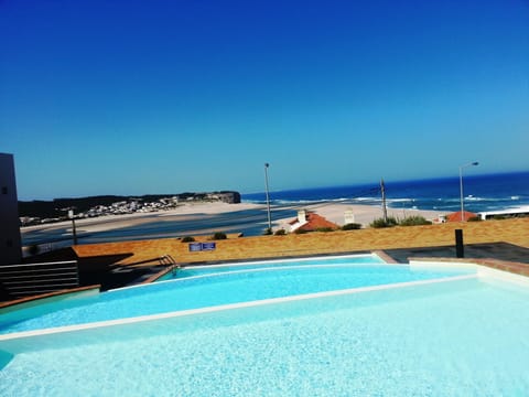 Stunning view of Foz do Arelho beach from pool area.
