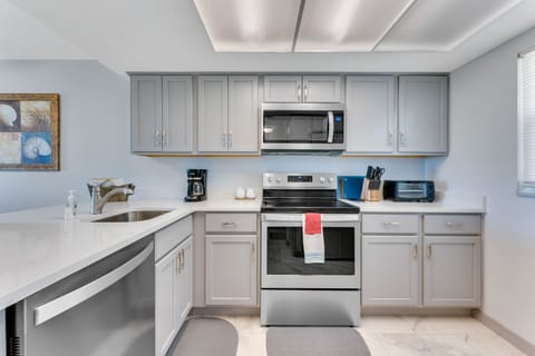 Upded appliances, cabinets, pots, pans, silverware.  