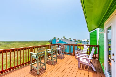 Relax on your private deck with colorful coastal views and comfortable seating for memorable mornings and peaceful evenings.