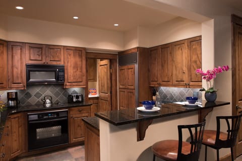 Cook up a storm in the full kitchen, and enjoy your very own wet bar!
