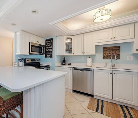 Fully stocked kitchen w quartz counters and ss appliances