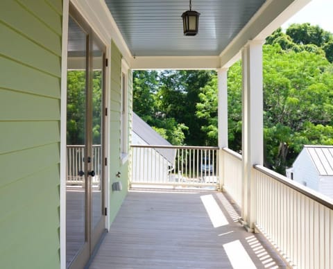 Green House - Upstairs southward facing porch is private to the Master Suite. French doors open up to the bedroom for enjoying nice weather . 