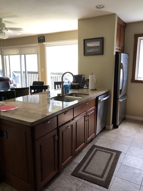 Open kitchen facing dining/living area