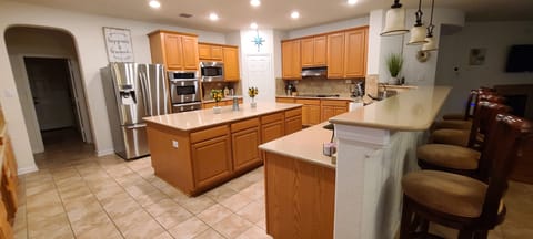 Island Kitchen with double ovens & microwave