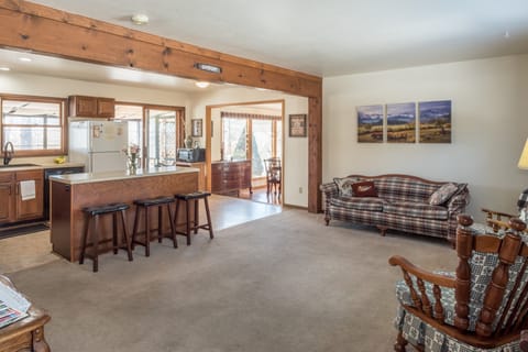 Large open living room & kitchen keeps your group together while preparing meals