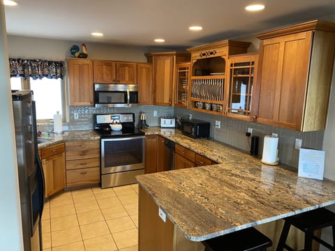 Kitchen with bar seating for 2.