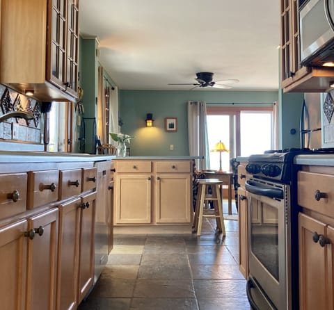 Cook with a lake view; lots of room for friends to hang out at the breakfast bar