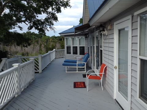 deck rear of house off den
