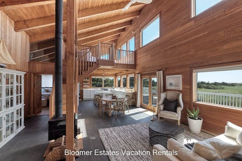 The main living space includes a wood burning stove