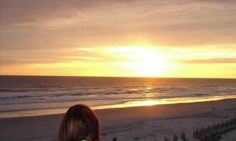 Enjoying my favorite time of the day at the beach on the balcony