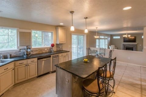Gourmet Kitchen w/2 Double Ovens, Over Sized Gas Cook top &SoapStone counter top