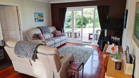 lounge area with very comfy counches and a great indoor outdoor  flow