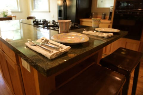 Kitchen island has dining stools