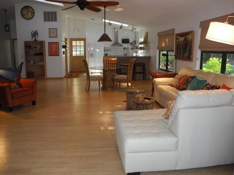From sunroom back through livingroom, diningroom, to kitchen. Door to garage.