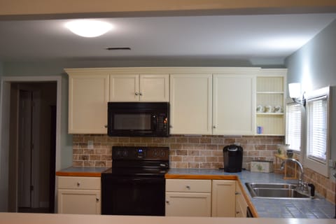 Kitchen is equipped with all major and small appliances.