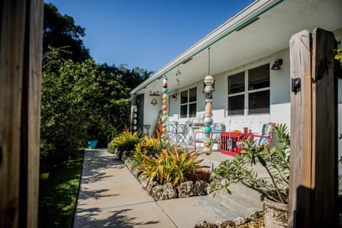 Front Entrance to the Garden Home w/outside seating and plenty of garden views.