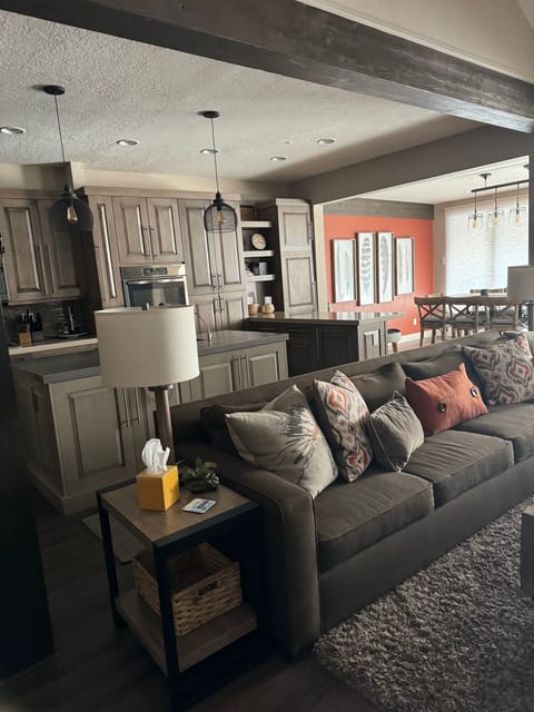 View of Family Room with 11' sofa toward kitchen and dining room. 
