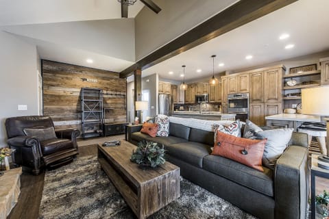  Family Room - 3 cowhide stools have been added to room in front of fireplace.