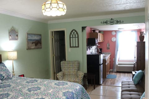 Our quaint little condo, decorated with wrought iron & hints of New Orleans!