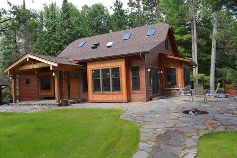 Cottage, terrace, and walkways - taken from southeast corner looking northwest