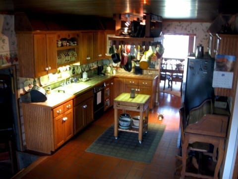 A large, full service kitchen has everything necessary to make gourmet meals.