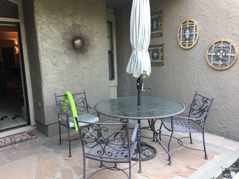 Sunny patio with umbrella for shade 