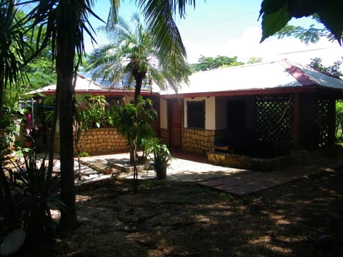 Private, secure and surrounded by coconut and fruit trees, tropical flowers 