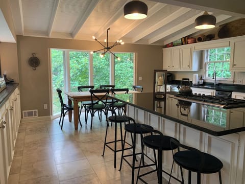 Large chefs kitchen; wolf cooktop, subzero fridge.  View of the lake